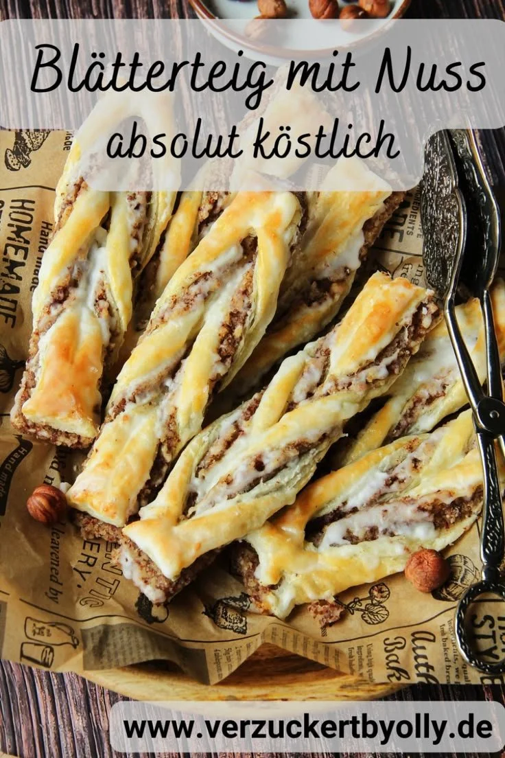 Blätterteiggebäck mit Nussfüllung und Puderzucker Glasur, köstlich und ansprechend.
